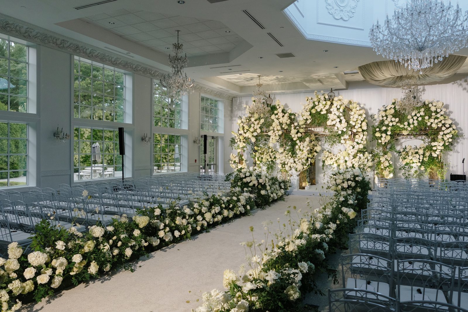 The ceremony aisle lined with white roses at The Addison Park