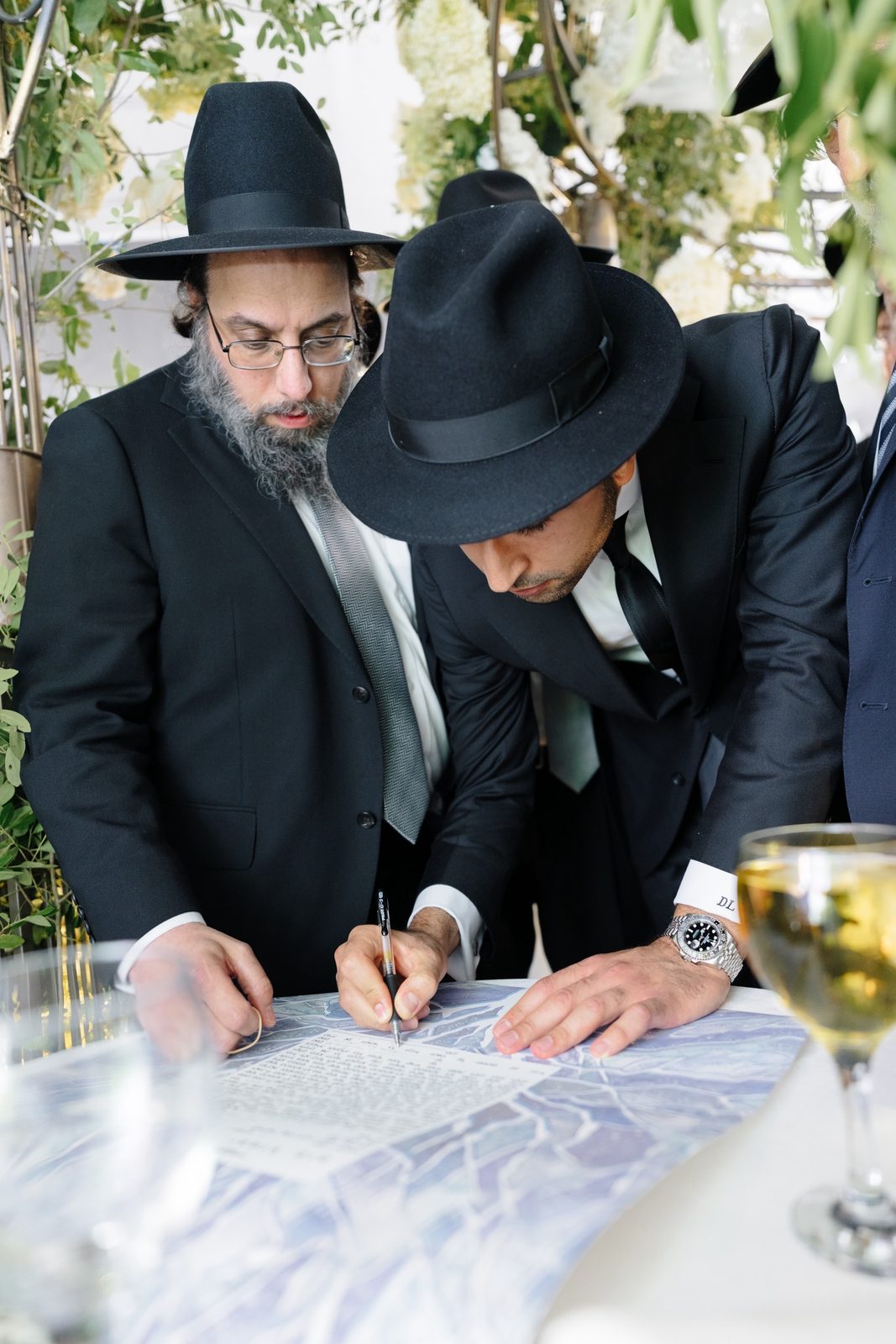 Rabbis signing the ketubah
