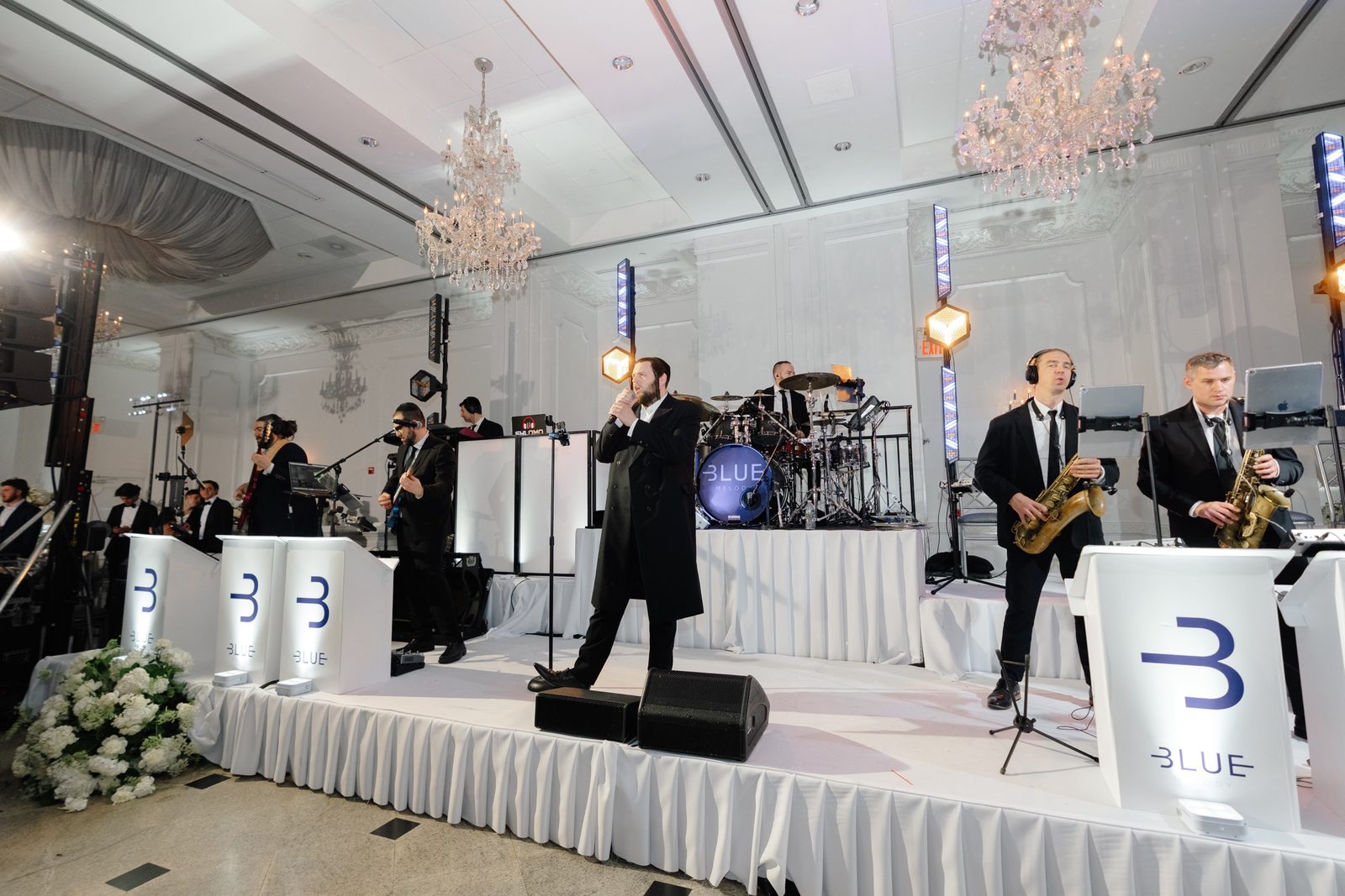 The band on stage in the ballroom