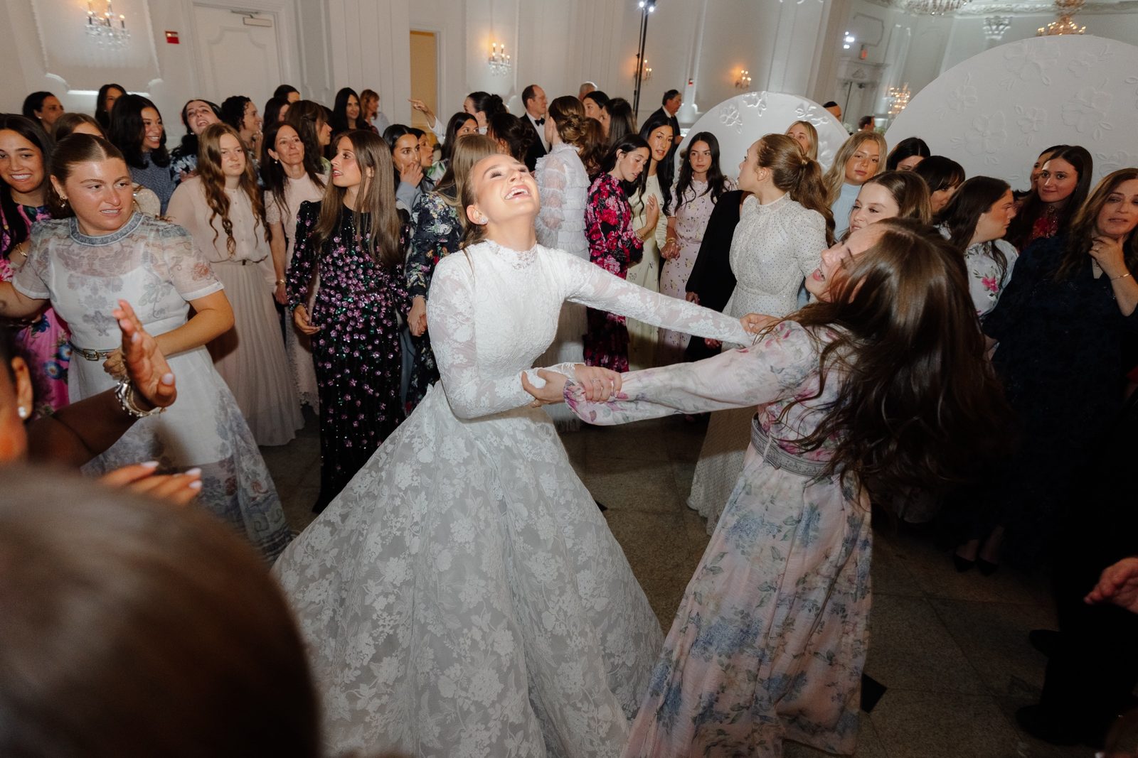 Guests dancing around Atara