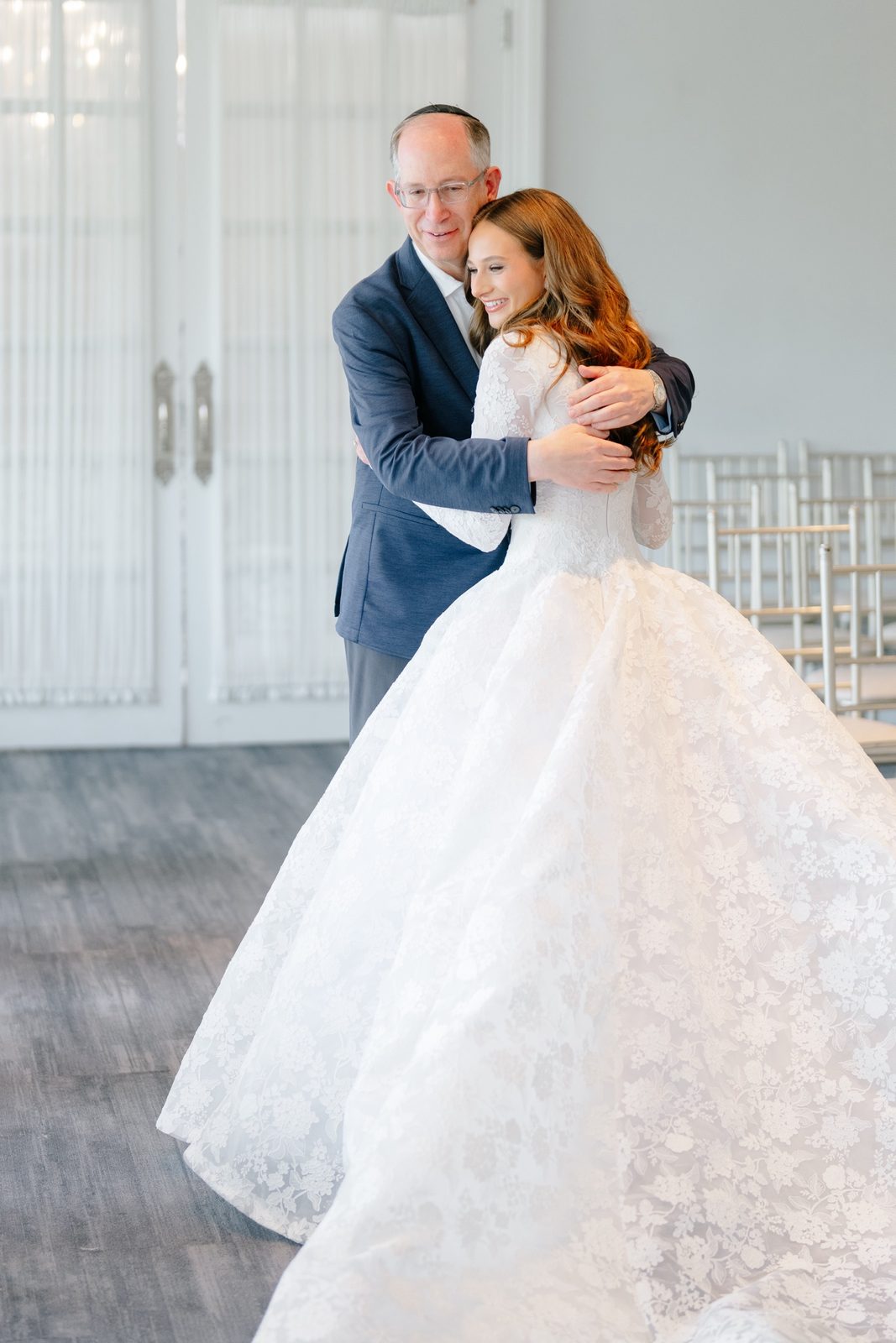 Atara’s father seeing her in her gown for the first time