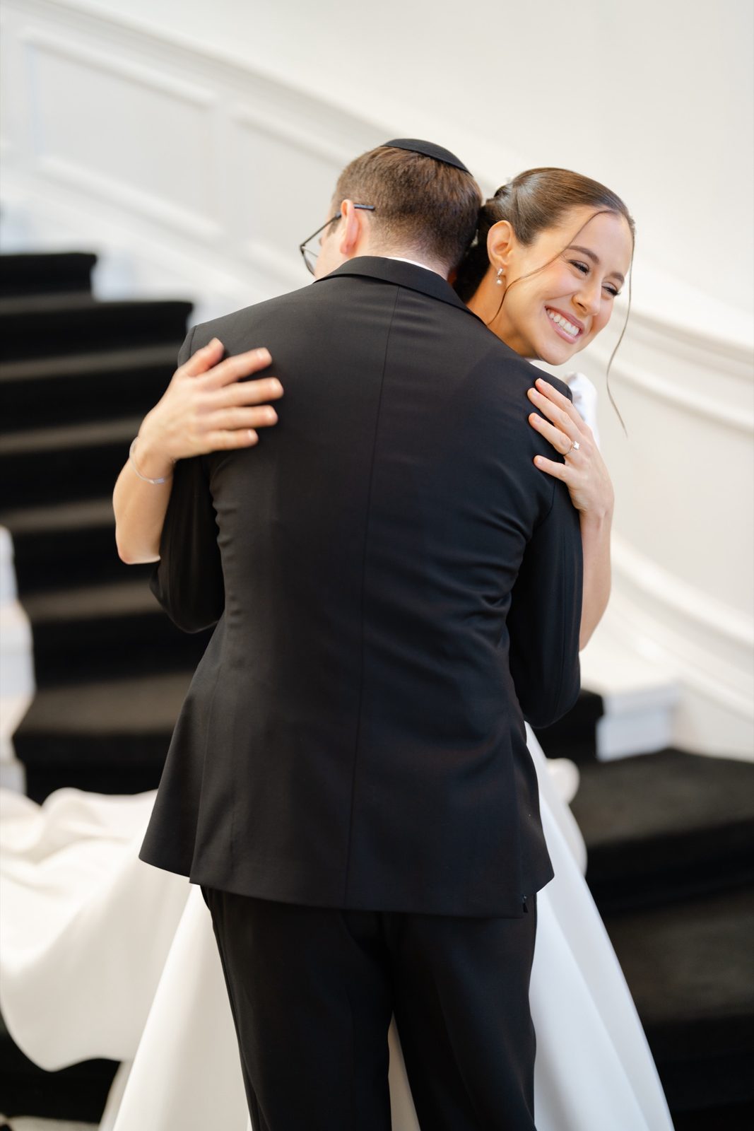 Kayla and Gabriel embracing at their first look