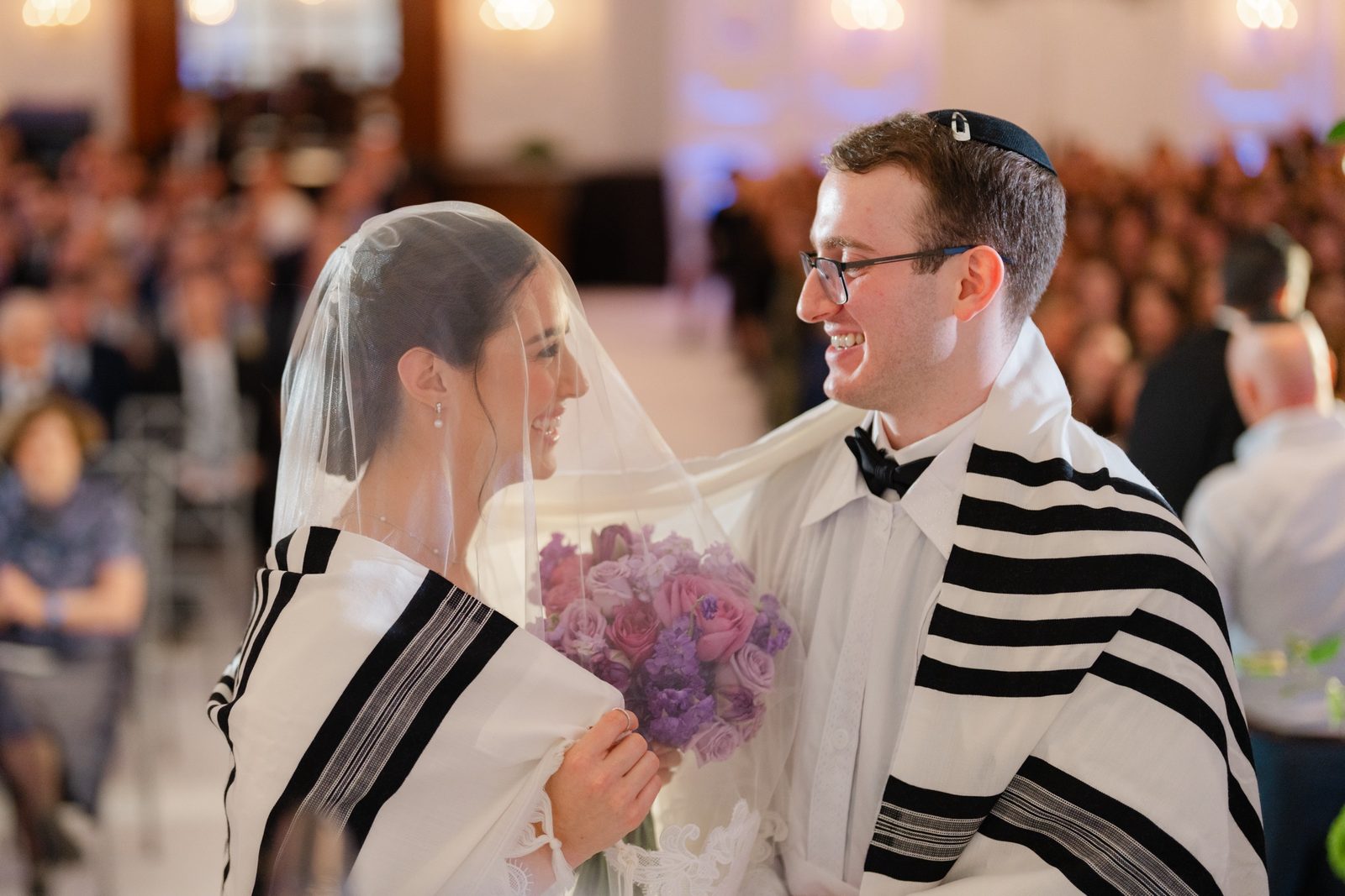 Kayla and Gabriel under the tallit