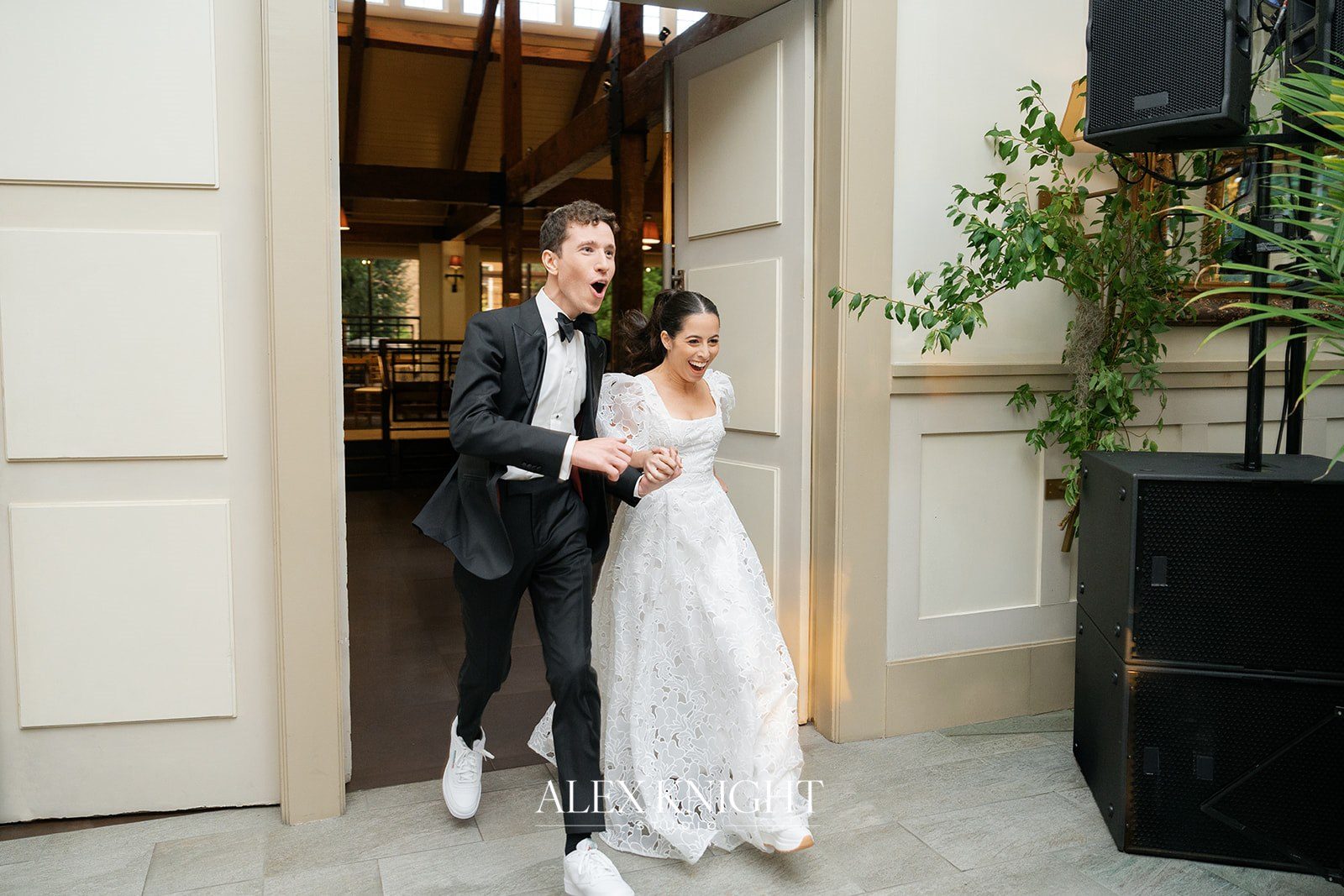 Aline and Tyler running into the reception