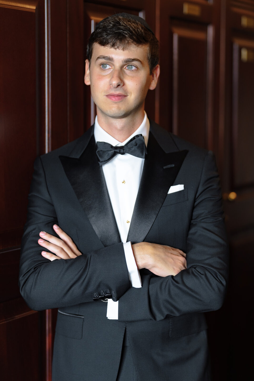 Charlie in his tuxedo in the wood-panelled locker room at Trump National Westchester