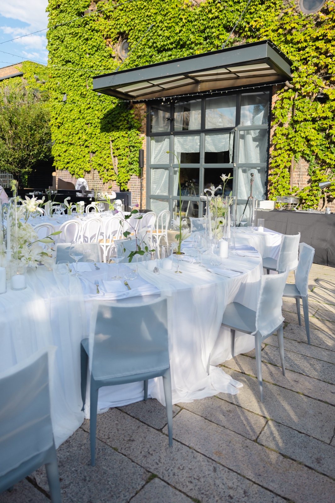 The ceremony set in the ivy courtyard
