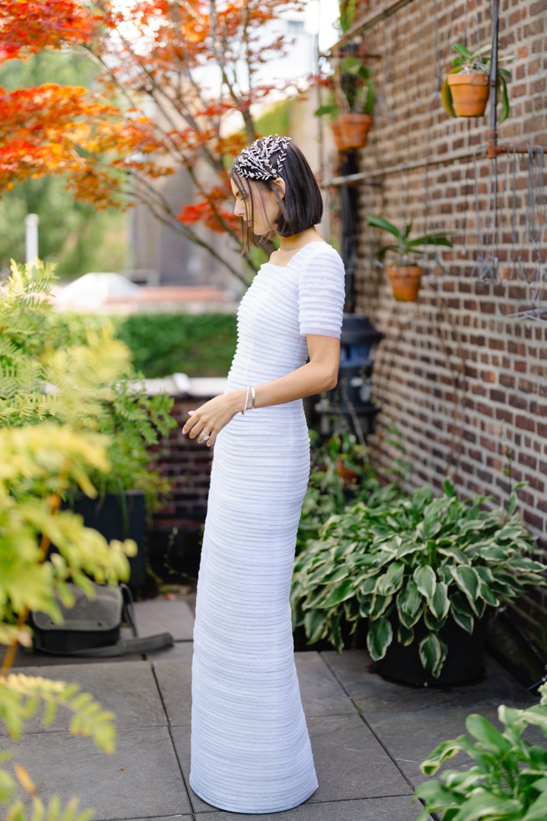 Daniella under the red maple in the rooftop garden