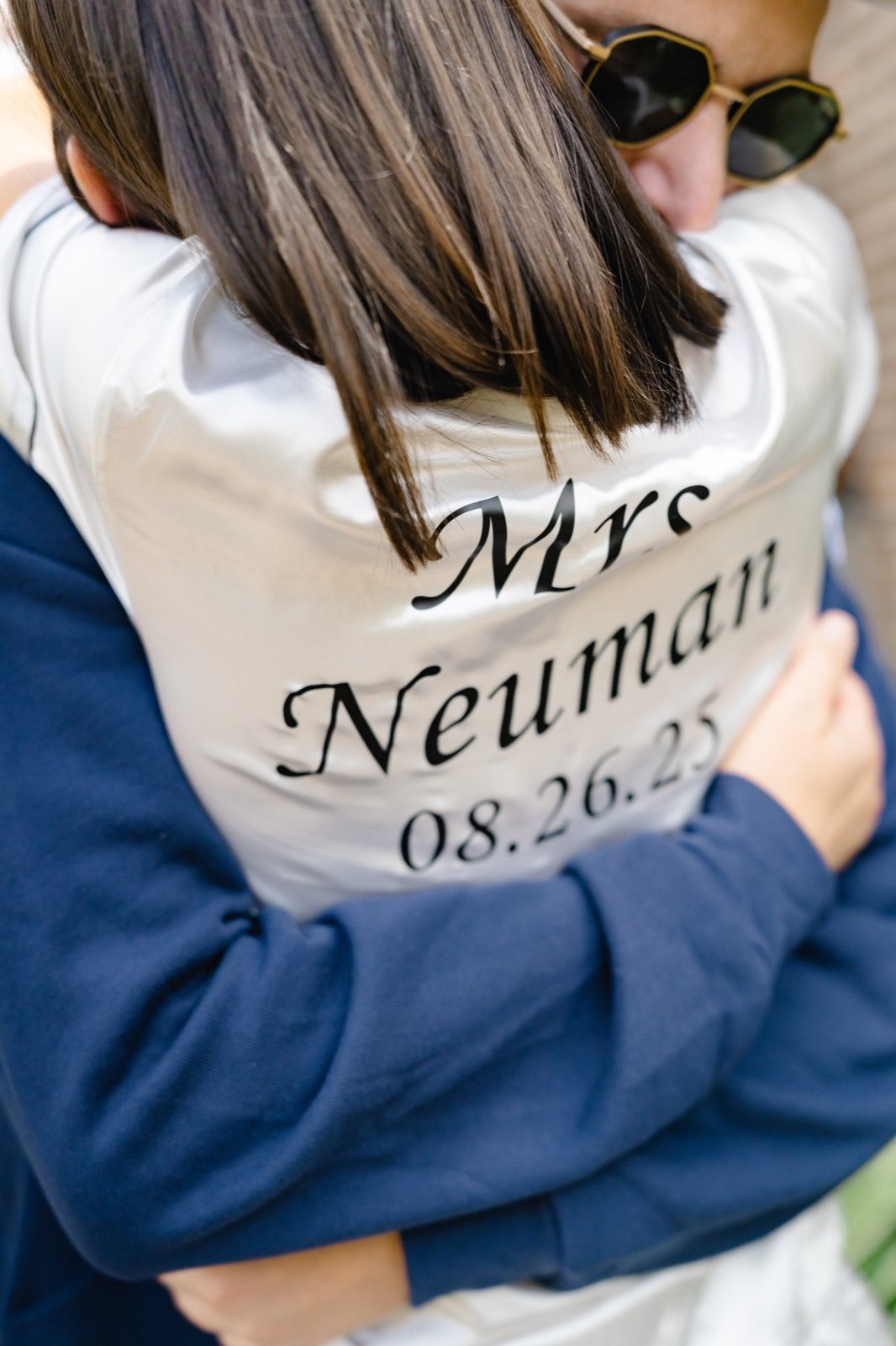 A hug in the Mrs. Neuman hoodie