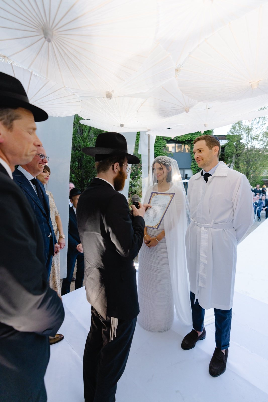 Under the white chuppah