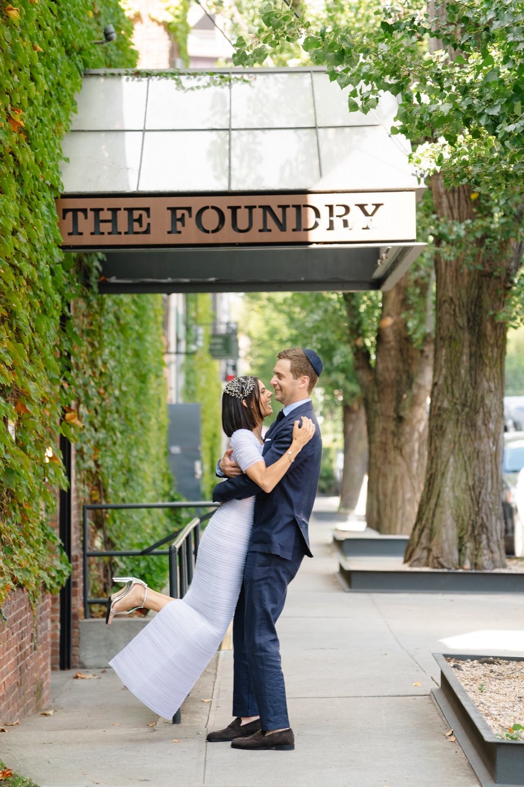 Under The Foundry sign