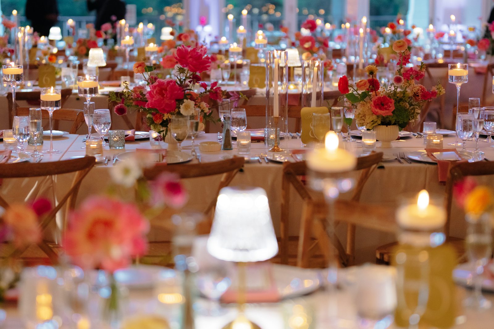 A detail from Dharma and Casey&rsquo;s colorful summer wedding at Bear Brook Valley