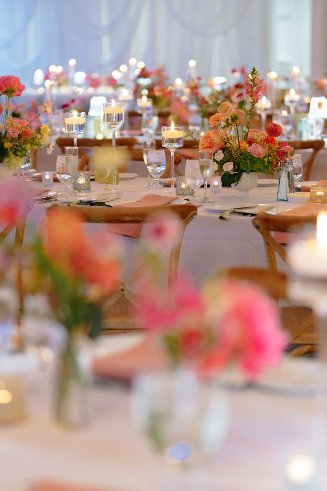 A detail from Dharma and Casey&rsquo;s colorful summer wedding at Bear Brook Valley