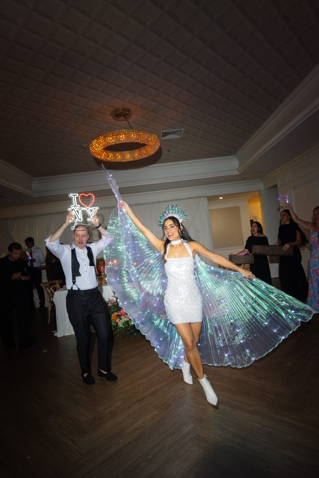 LED butterfly wings spread wide during the Hora Loca