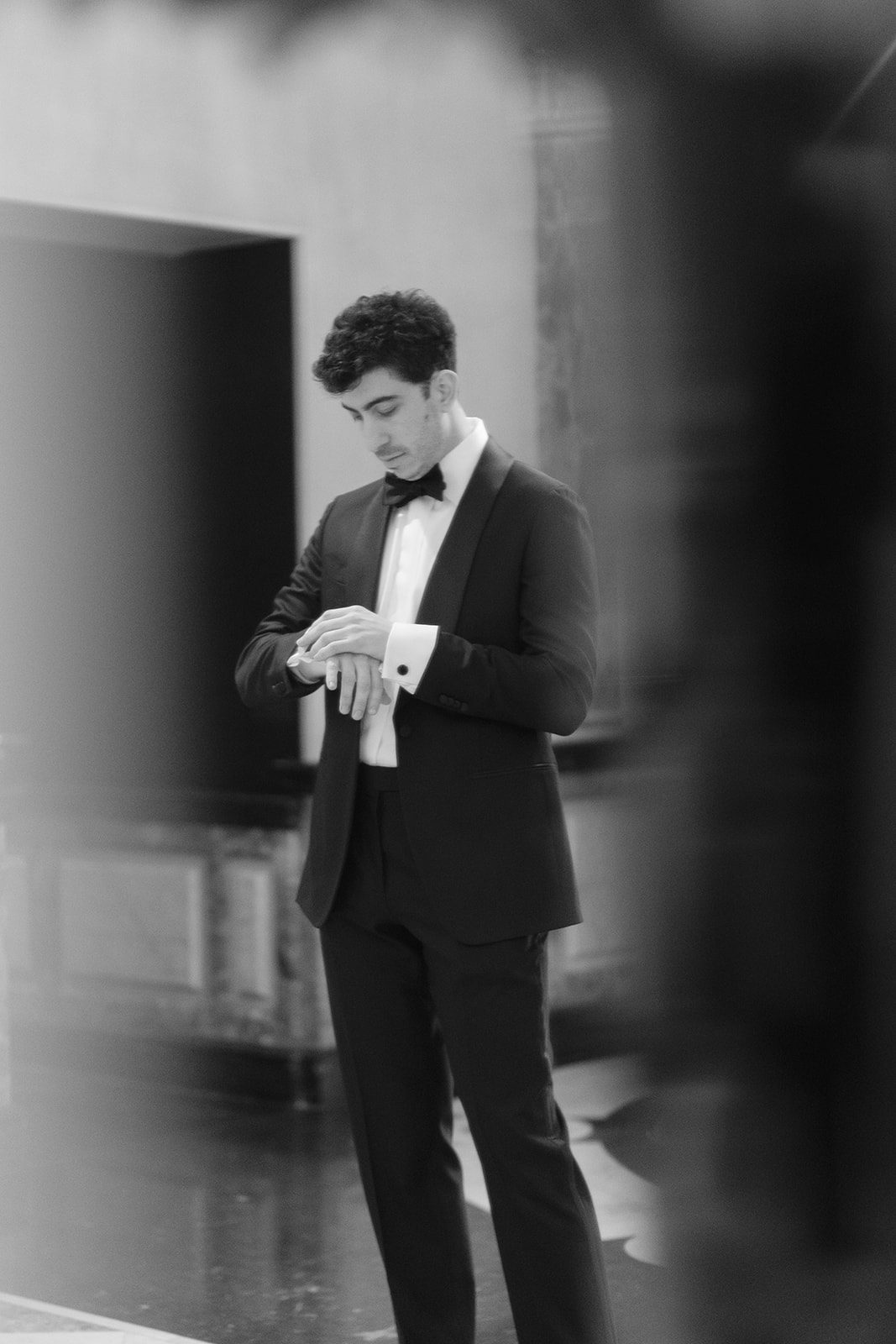 Ben getting ready, photographed in black and white