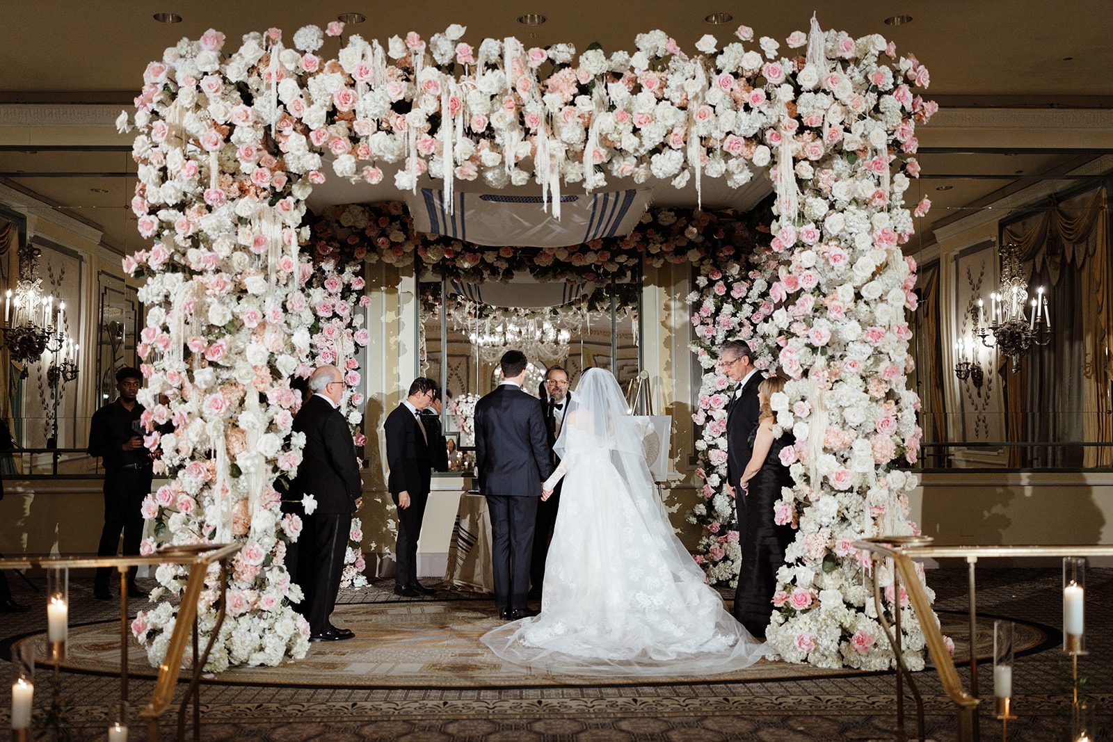 The chuppah of white and blush roses at The Pierre