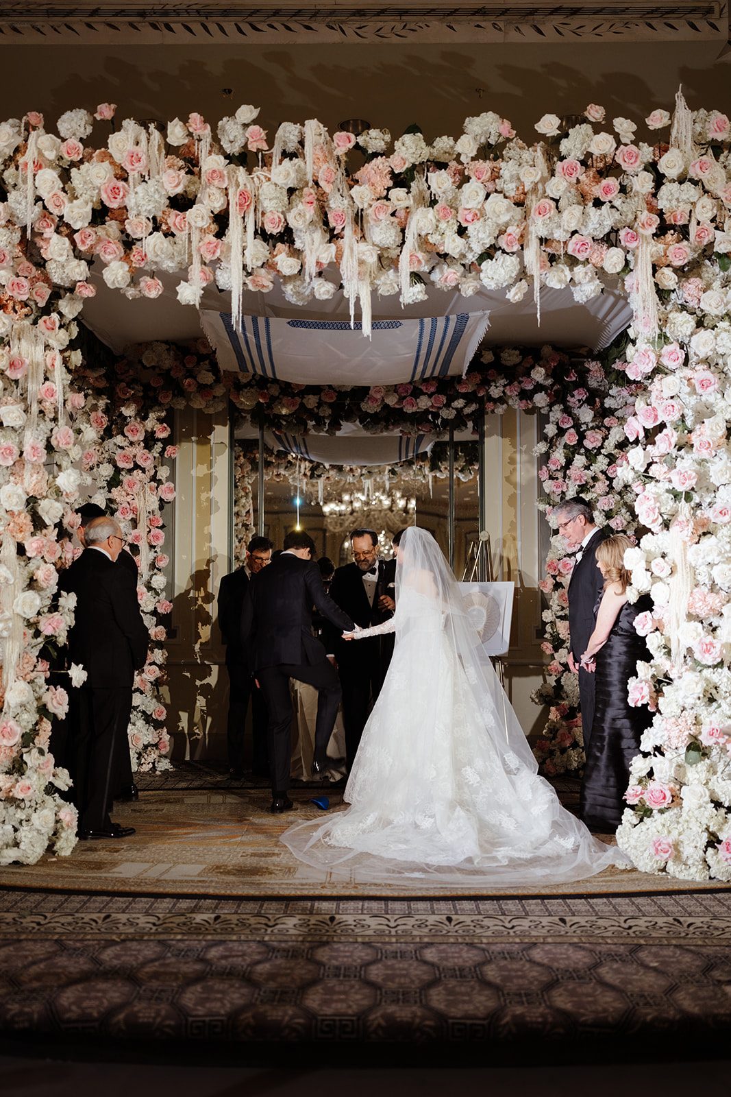 The ceremony under the rose chuppah at The Pierre