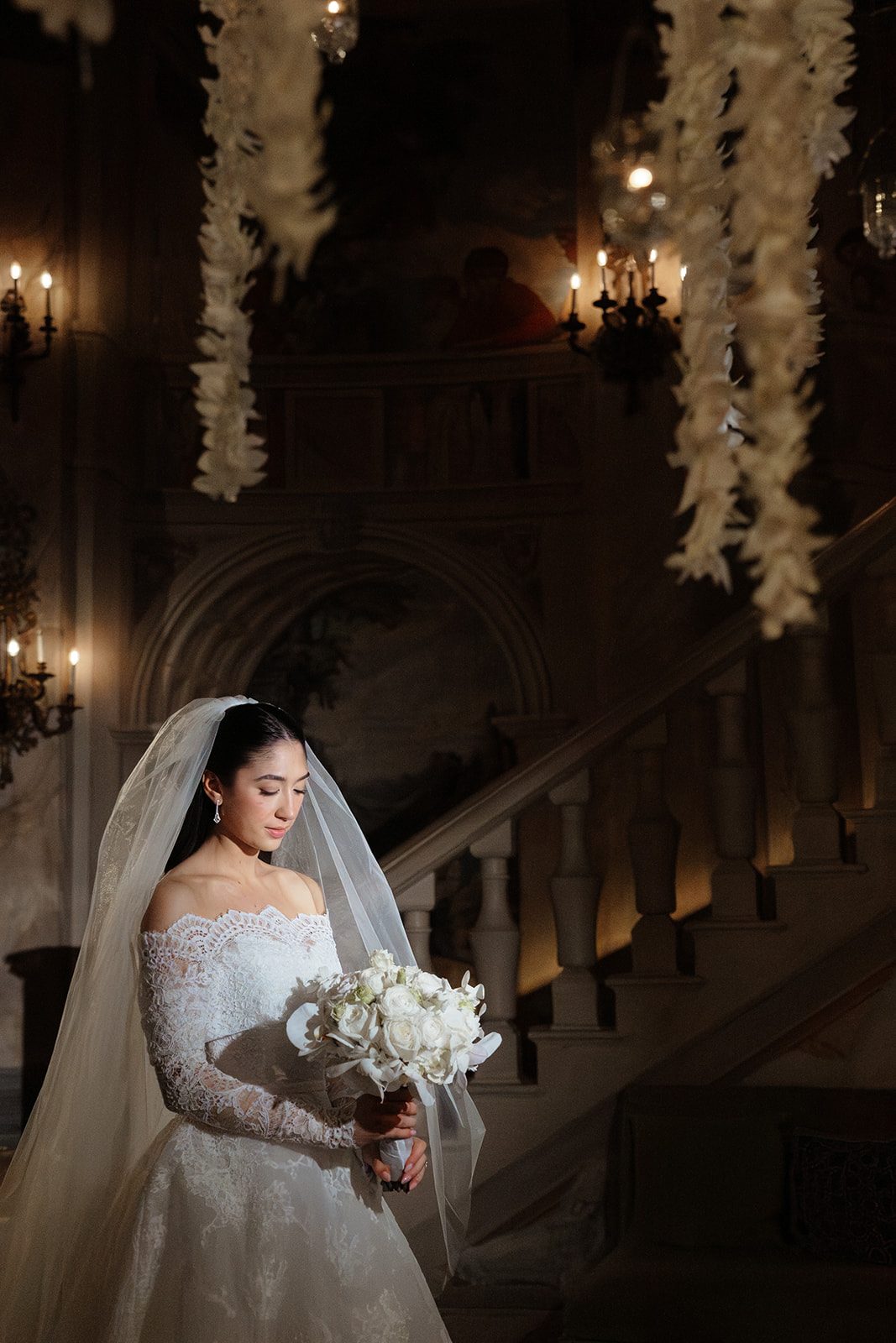 Dori with her bouquet on the Rotunda staircase at The Pierre