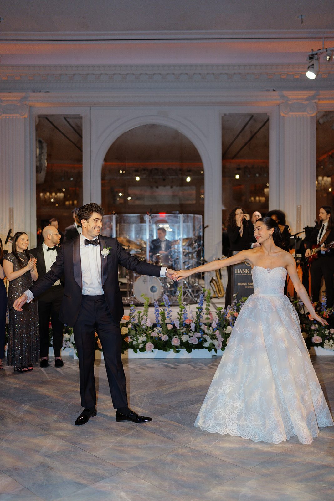 Dori and Ben reach for each other on the dance floor