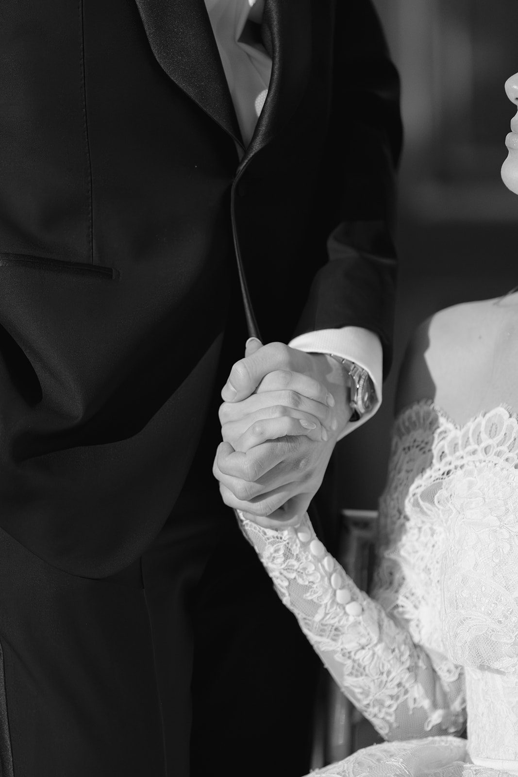 Dori and Ben&rsquo;s hands, held tight, in black and white