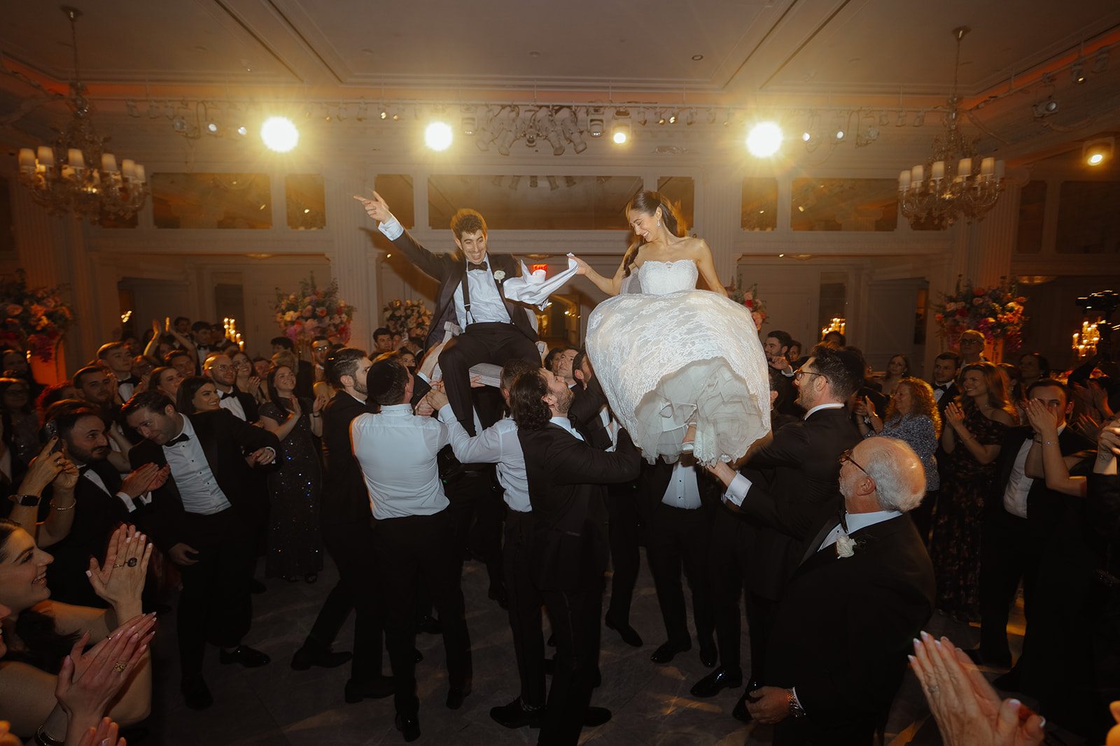 Dori raised above the crowd during the hora