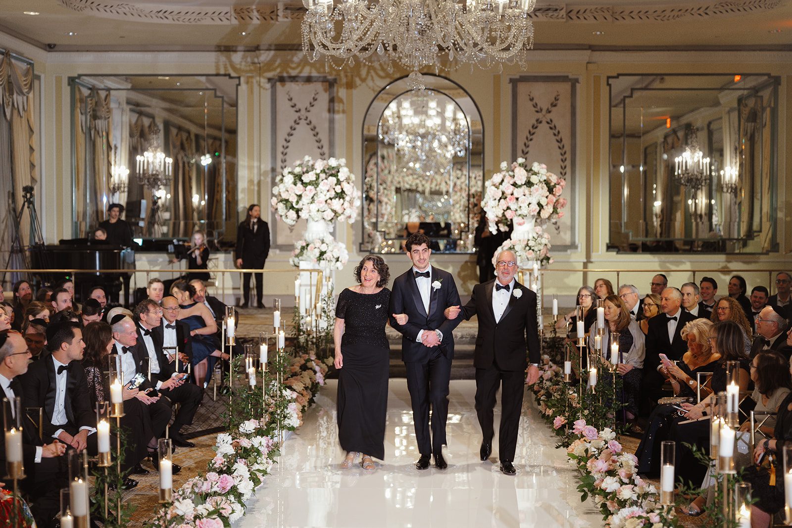 The processional down the candlelit aisle