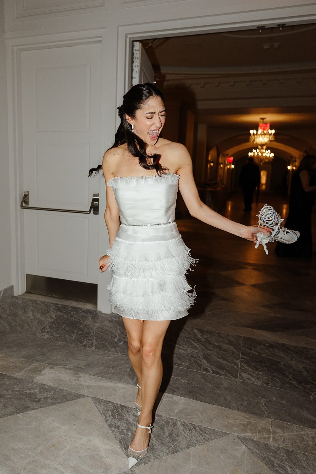 Dori in her fringe dress and sneakers, ready to dance