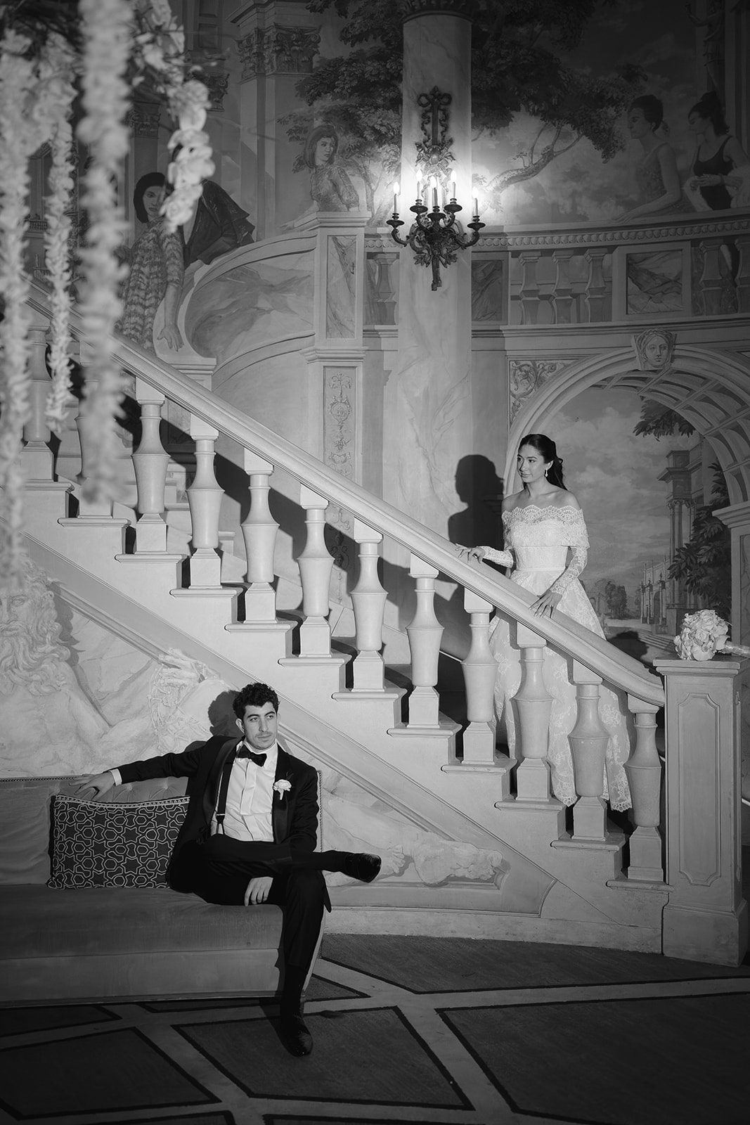 Ben seated on the Rotunda stairs, in black and white