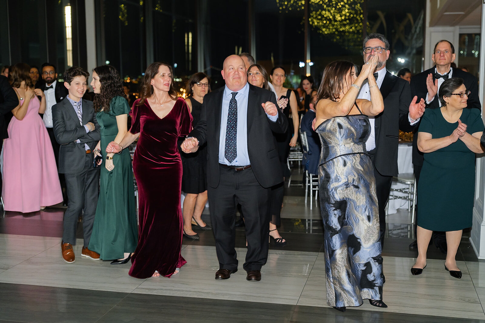 The family dances the hora
