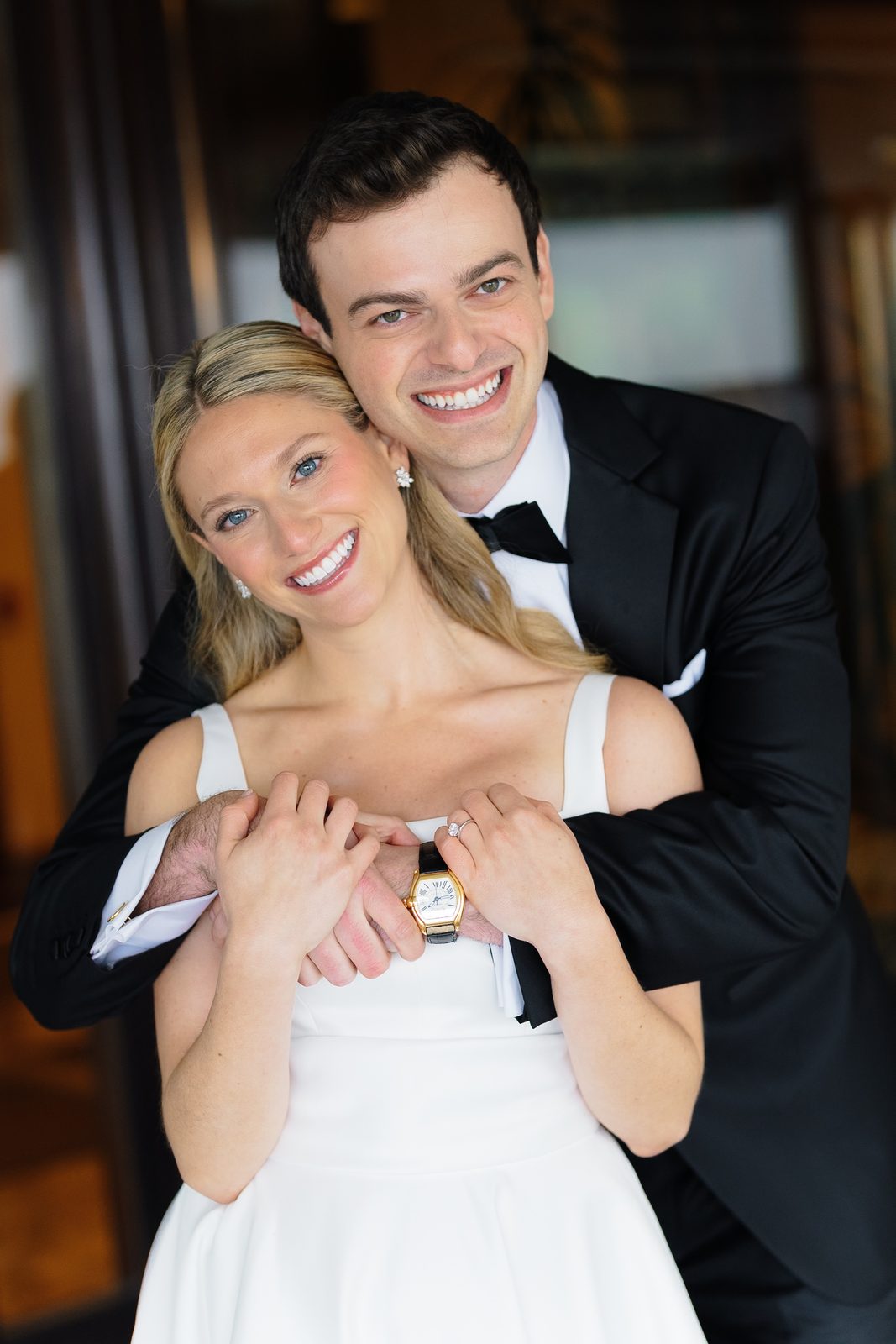 Hana and David laughing together in a portrait at Glen Island Harbour Club