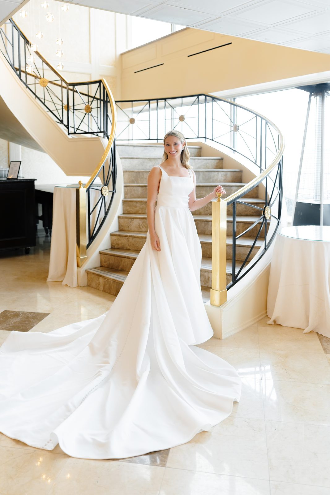 Hana on the curved grand staircase at Glen Island Harbour Club