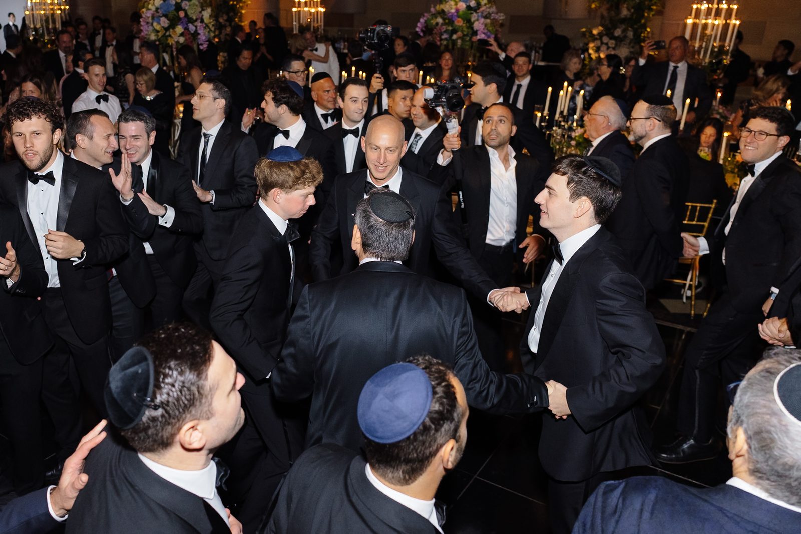 The hora at Gotham Hall, guests dancing shoulder to shoulder after the ceremony