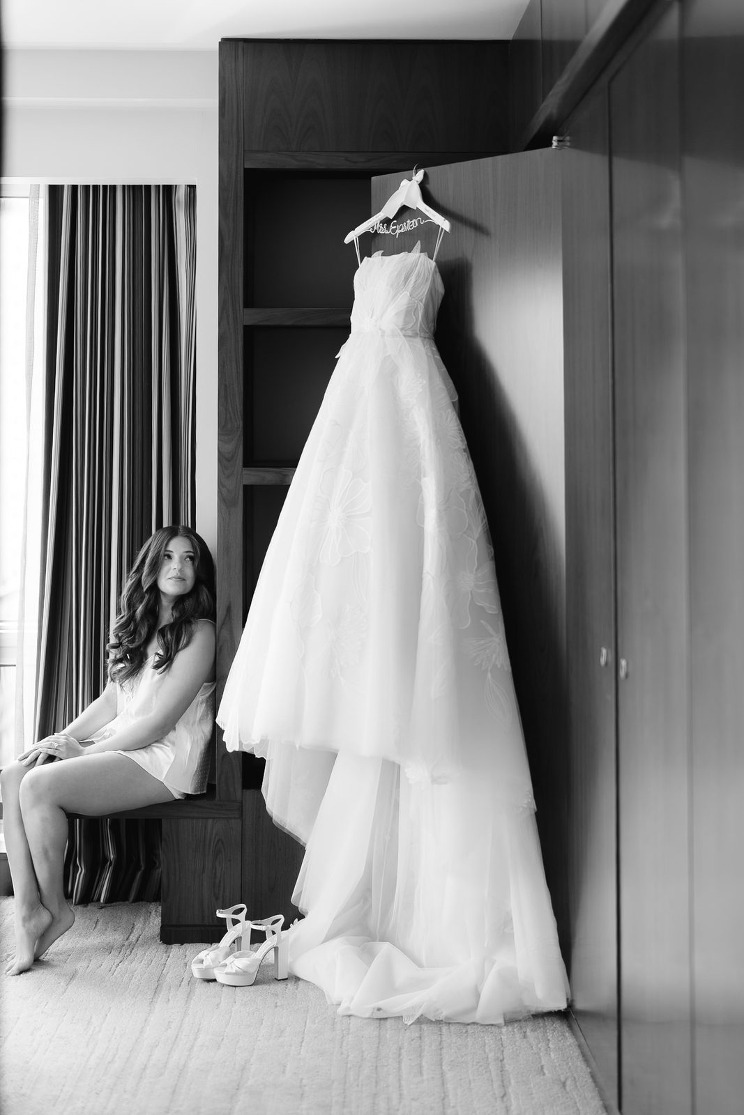 Jessie beside her gown in her suite at The Langham, Fifth Avenue on the morning of the wedding