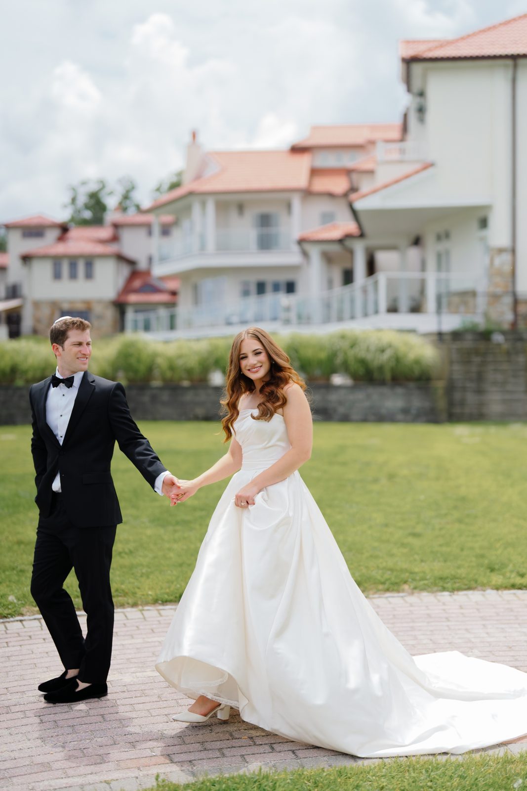 Maayan twirling on the waterfront path at Greentree Country Club