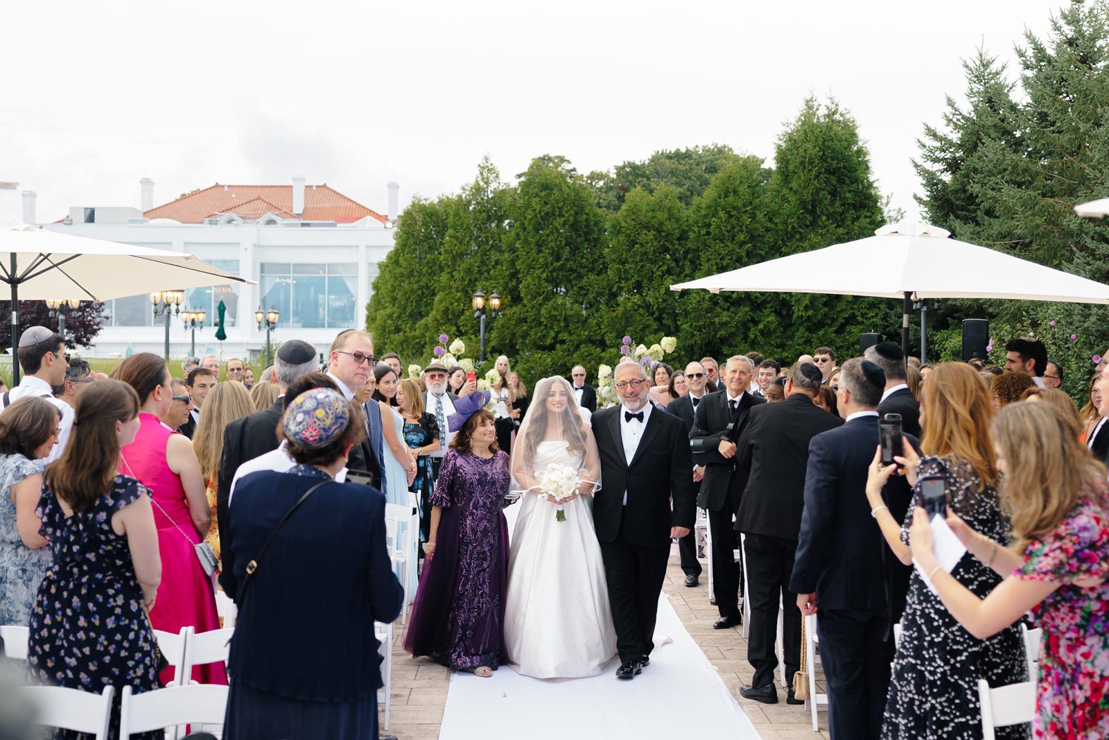 Under the floral chuppah at Greentree Country Club, New Rochelle NY