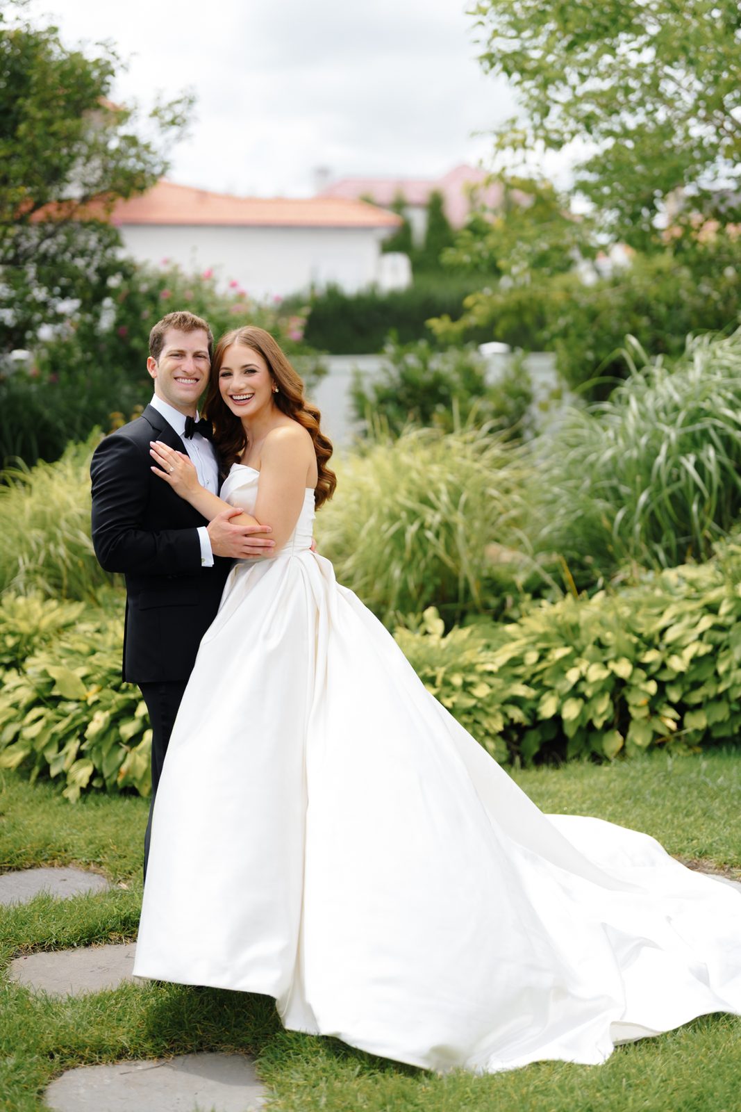 Bride and groom portrait in the gardens at Greentree Country Club