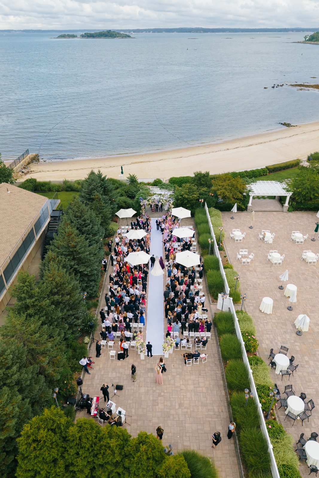 Aerial view of the waterfront wedding ceremony at Greentree Country Club, New Rochelle NY