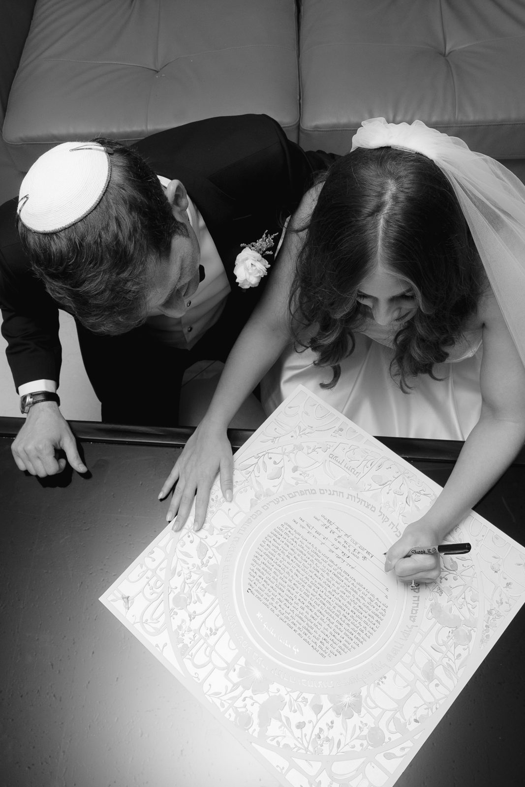 The ketubah signing in black and white