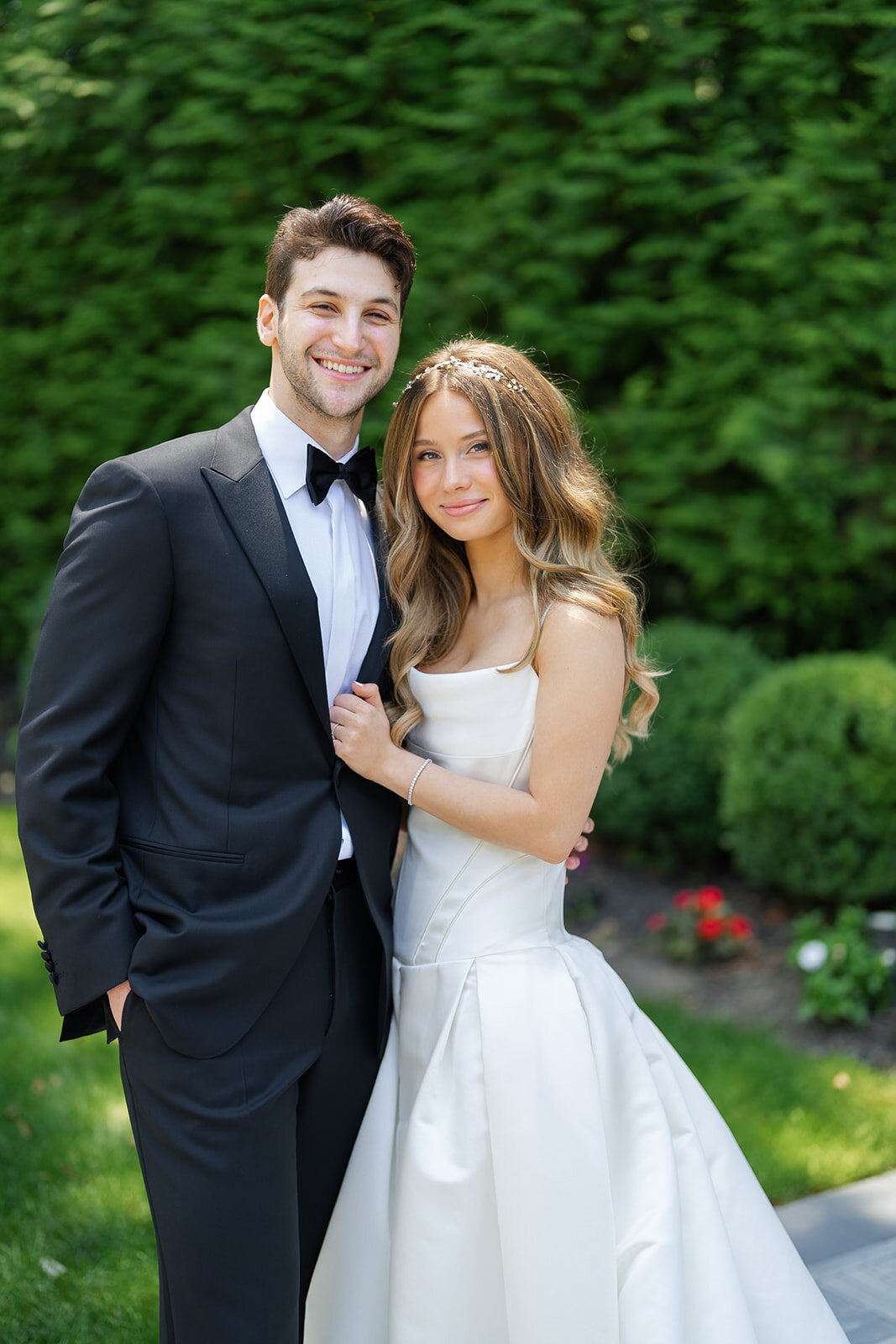 Noa and Nate hold each other close in the gardens after their first look
