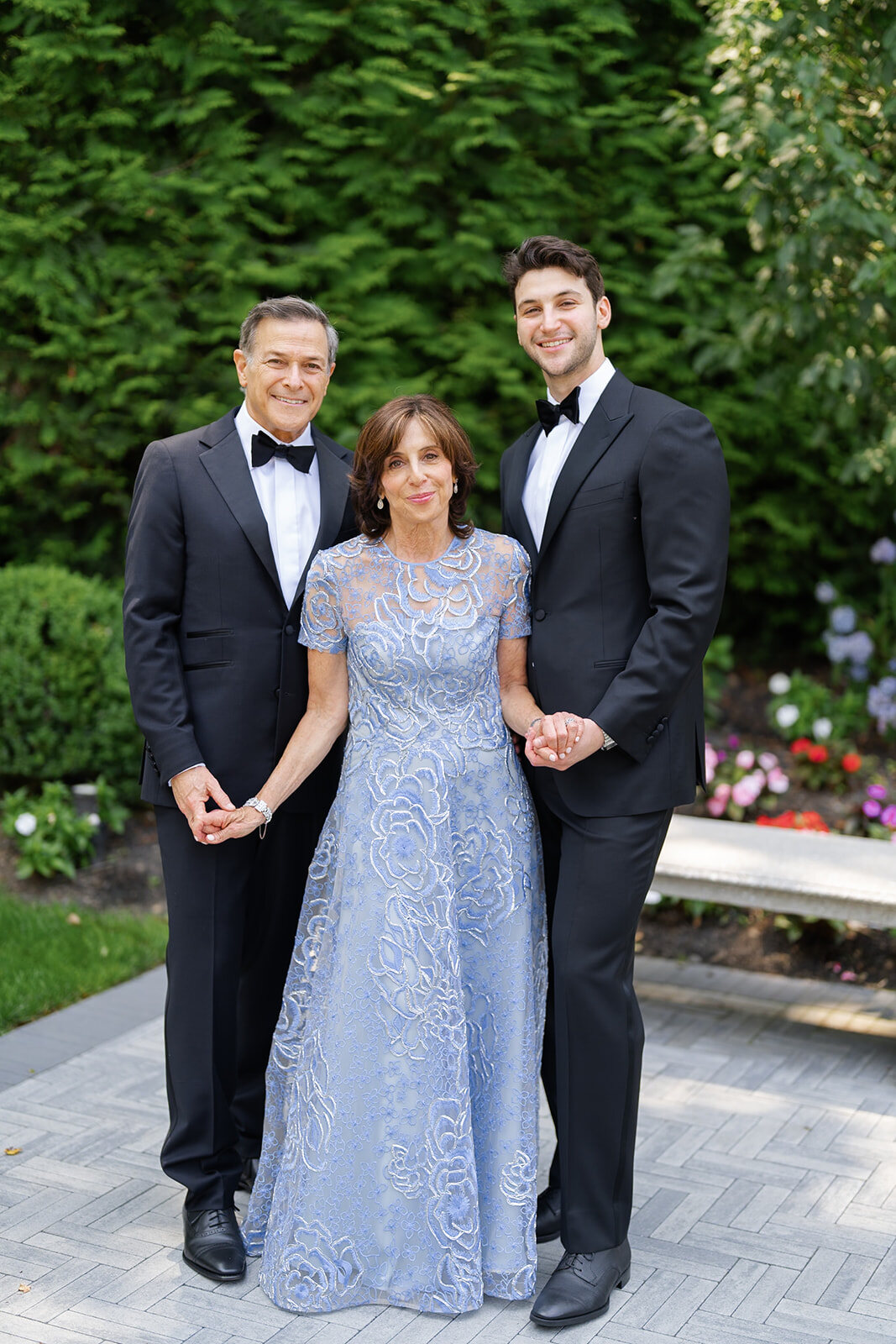 Nate with his parents in the gardens