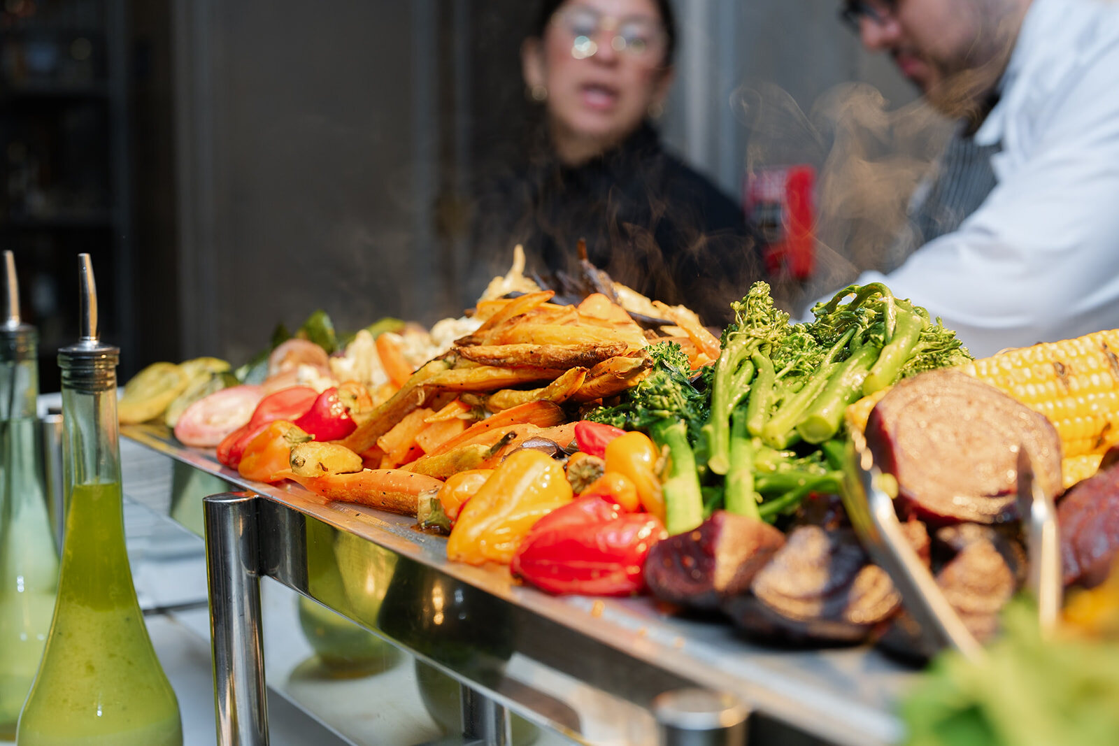 A smorgasbord station of grilled vegetables before the ceremony