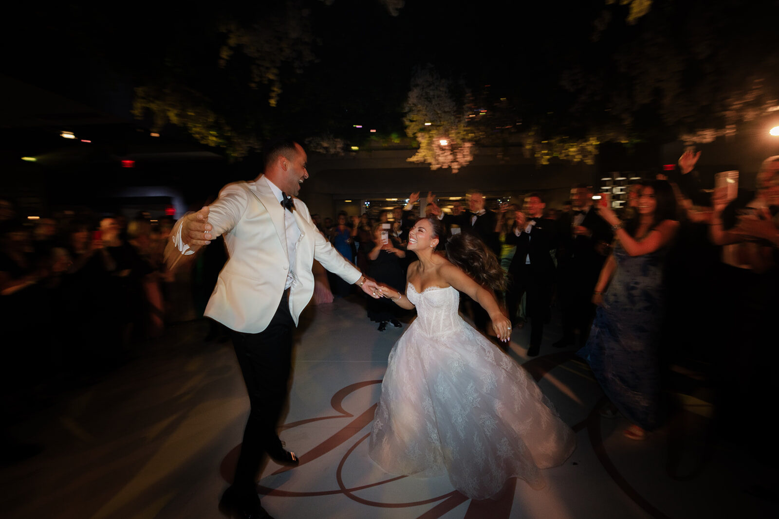 Ashley and Ben on the dance floor at Old Westbury Hebrew Congregation during the hora