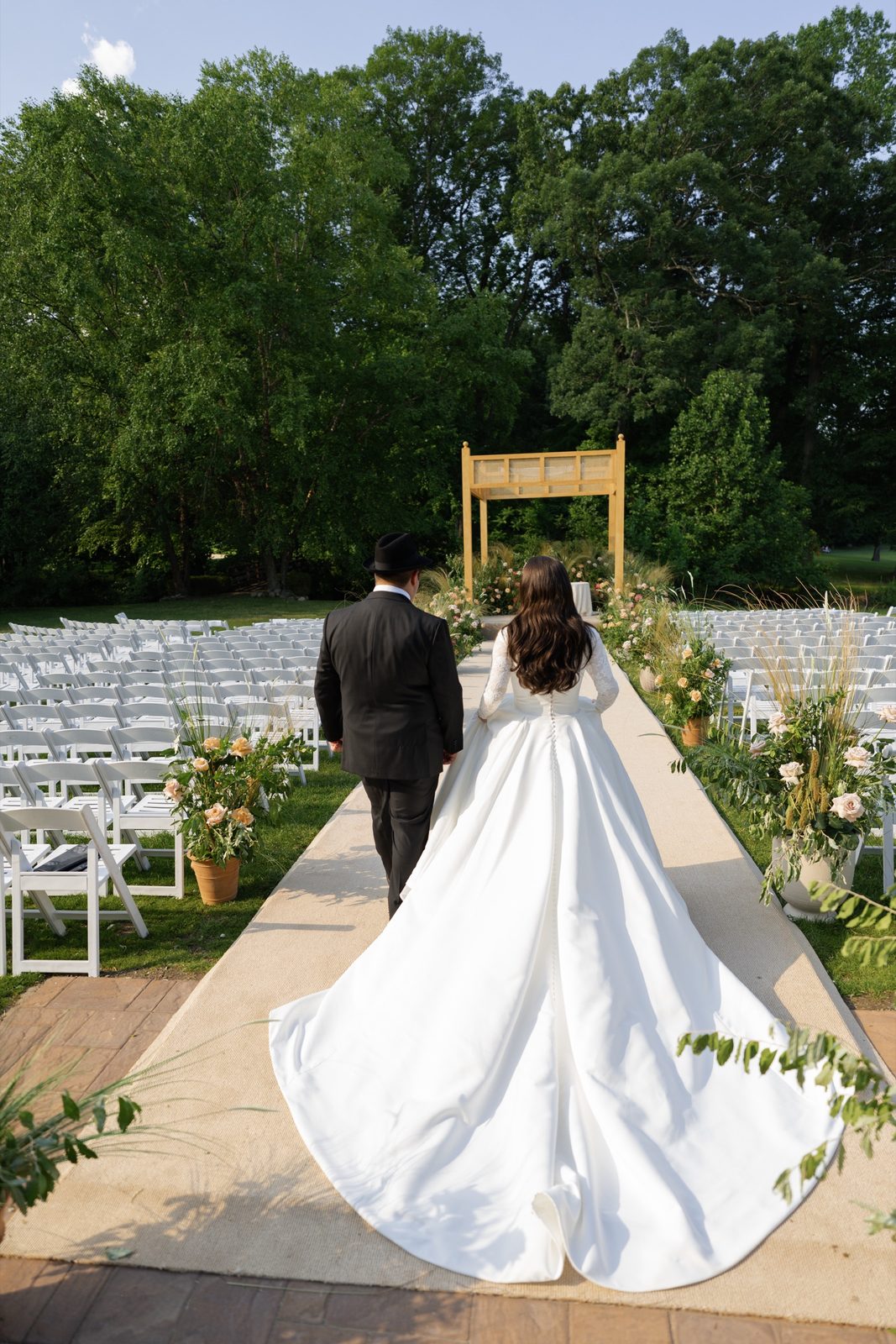 Goldie walking toward the chuppah
