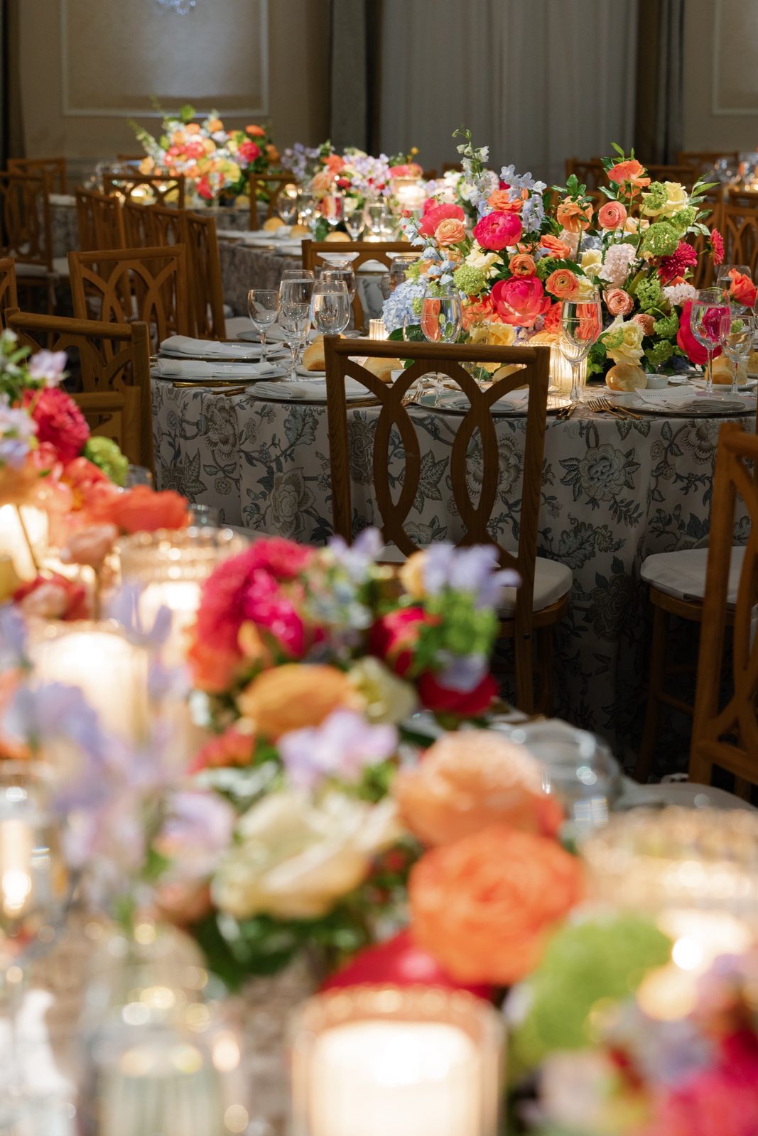Candlelit centerpieces in warm colors