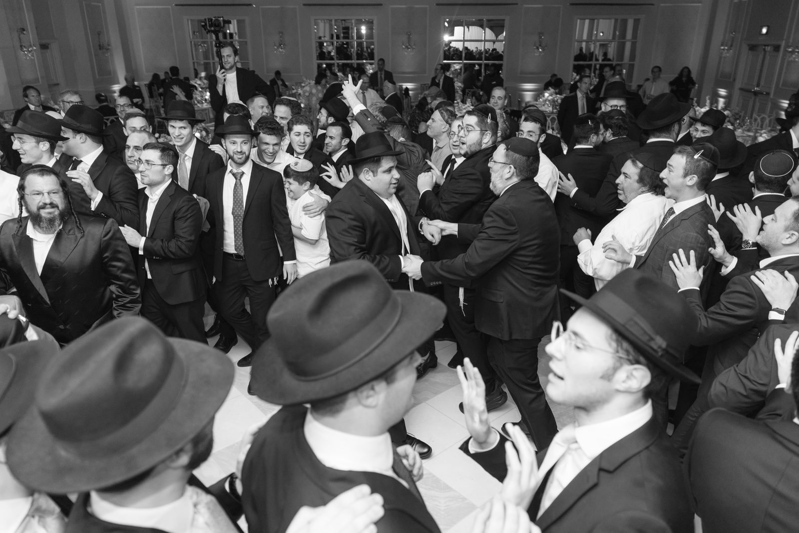 The men’s dancing in the ballroom