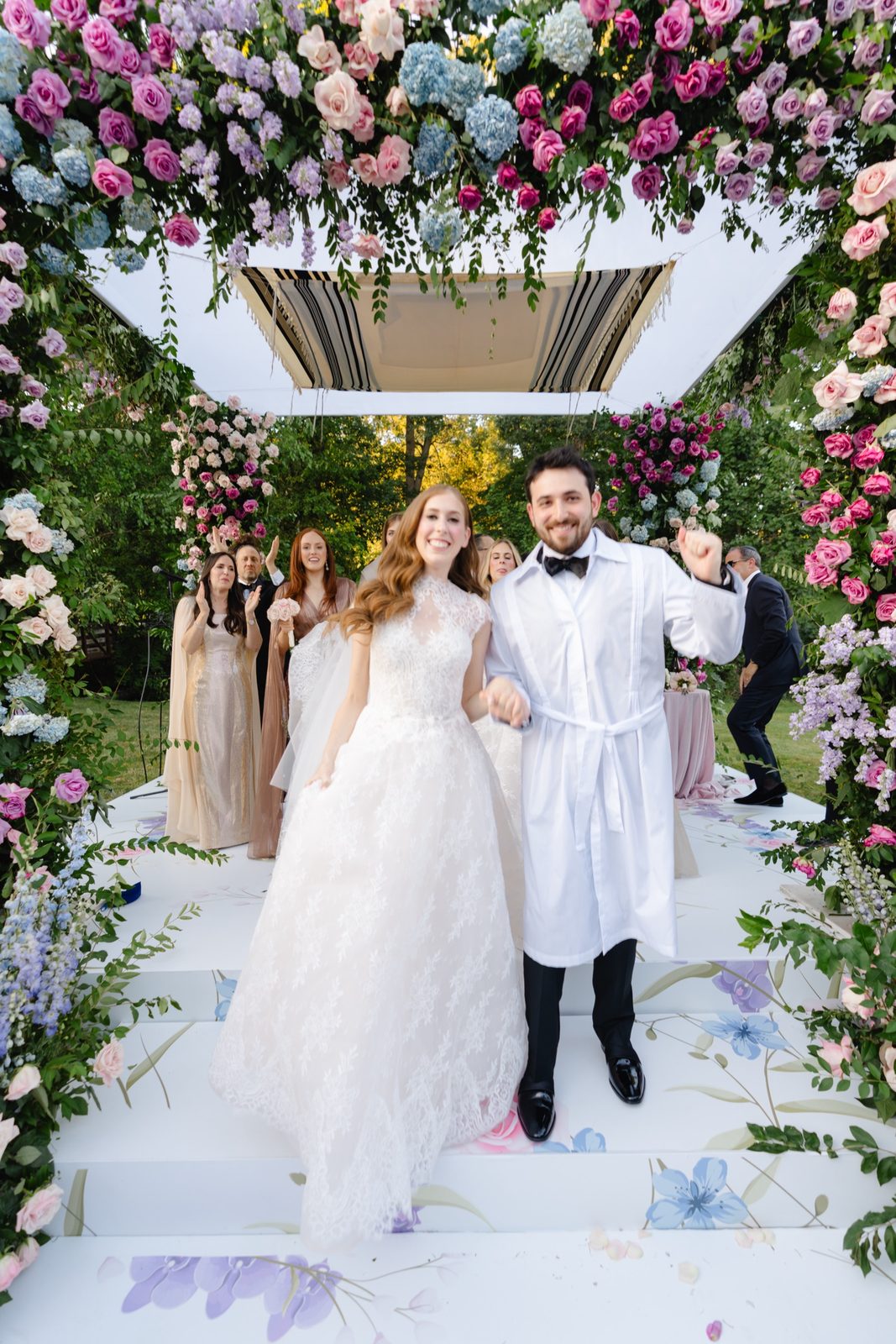 Haley and Evan just married under the chuppah