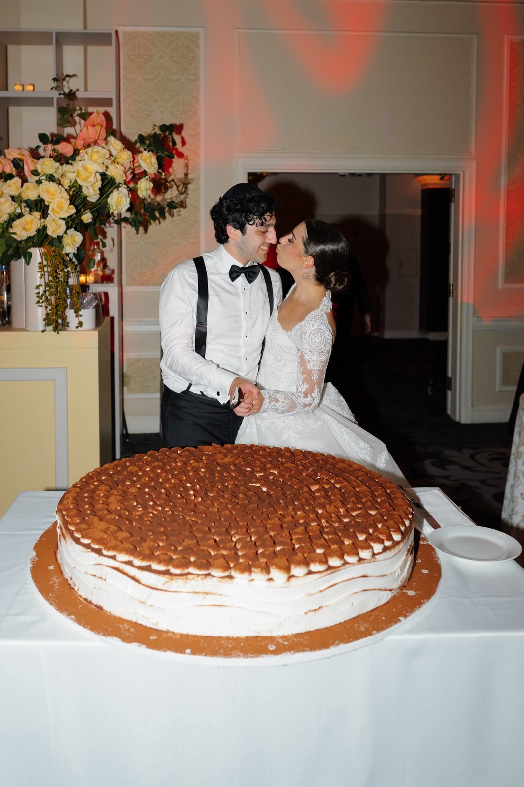 Tommi and Zach cutting the cake