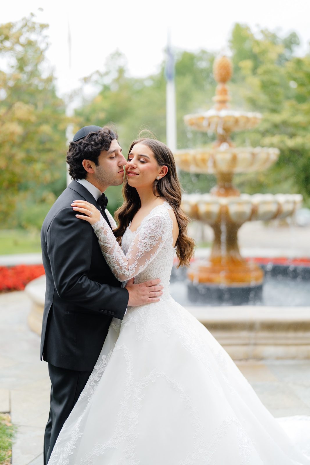 Tommi and Zach in front of the fountain