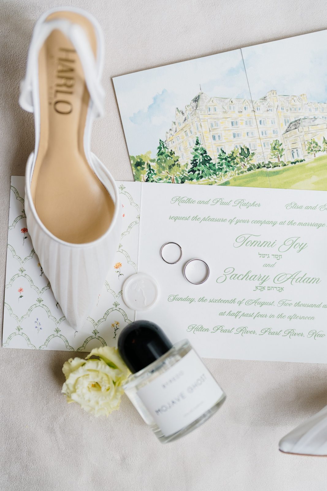 The invitation suite with rings and heels