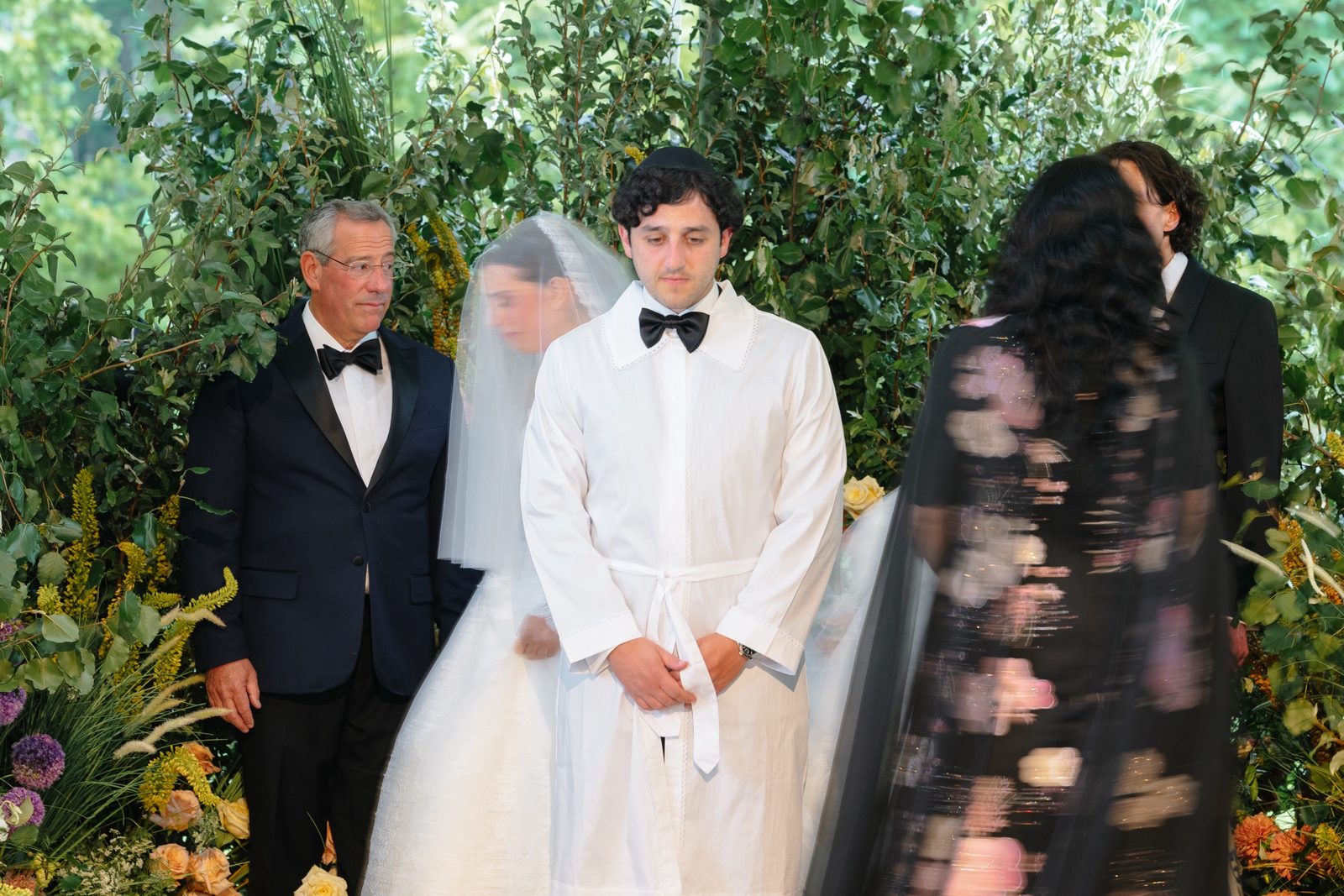 Tommi and Zach under the chuppah