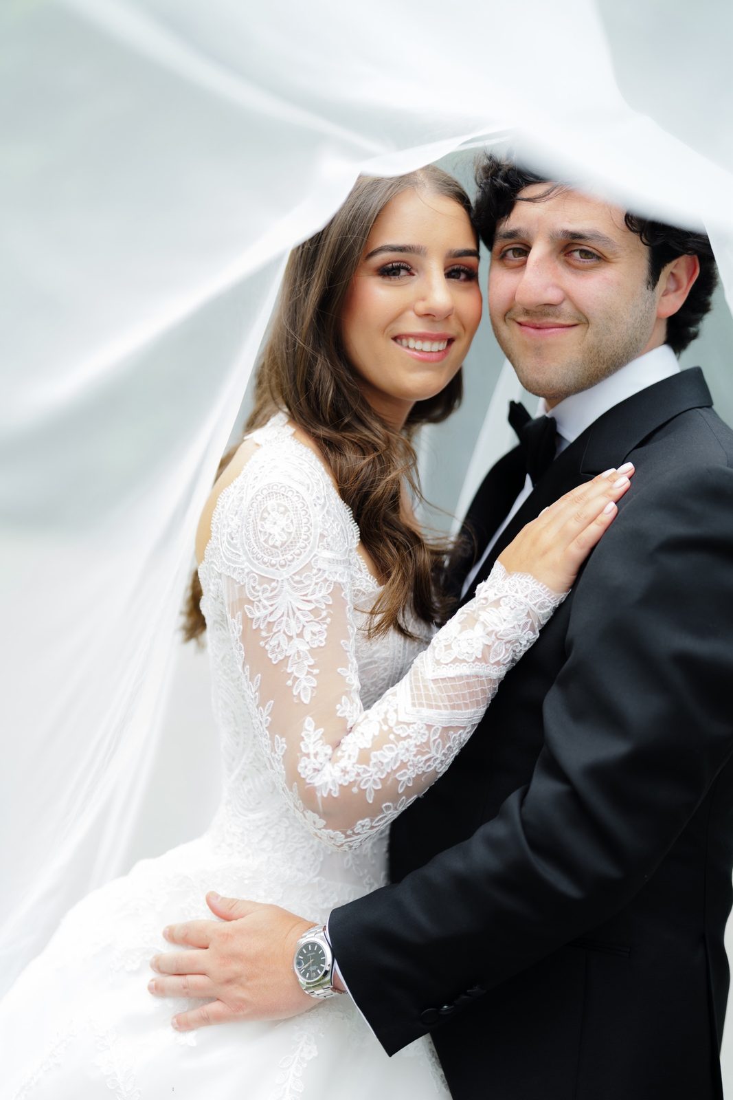 Tommi and Zach under her veil